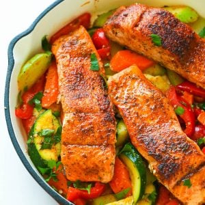 Blackened salmon on a bed of sauteed veggies