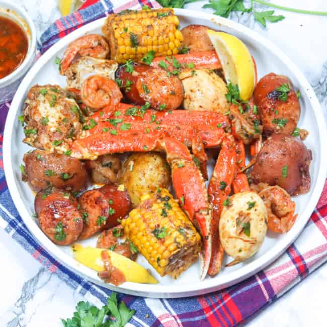 Serving up a big plateful of seafood boil in a bag