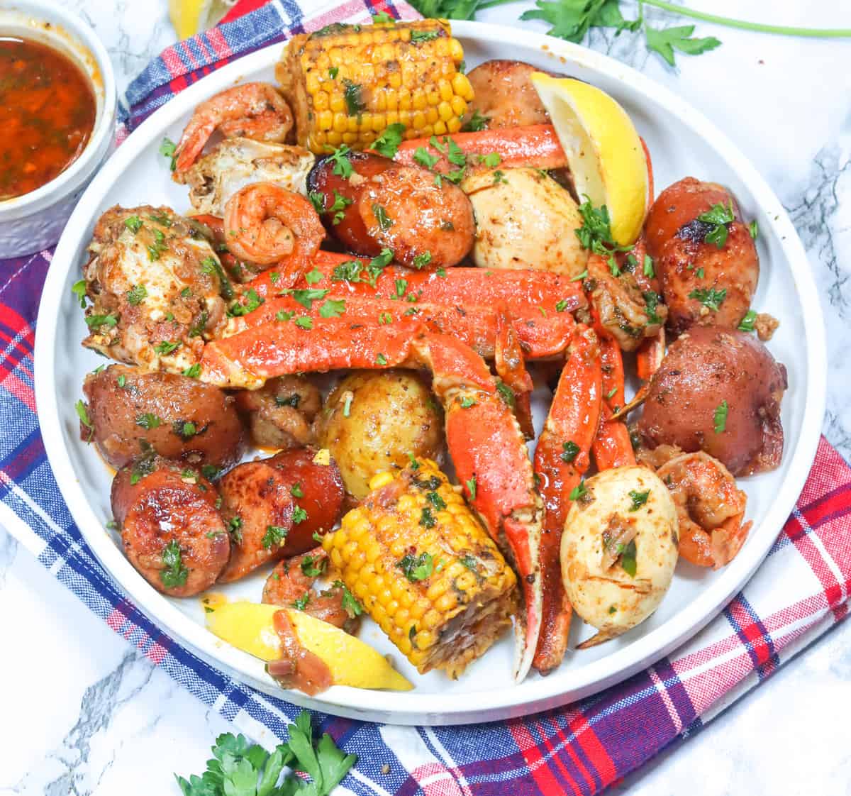 Serving up a big plateful of seafood boil in a bag