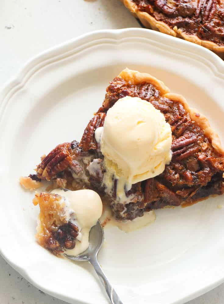 Chocolate Pecan Pie topped with vanilla ice cream