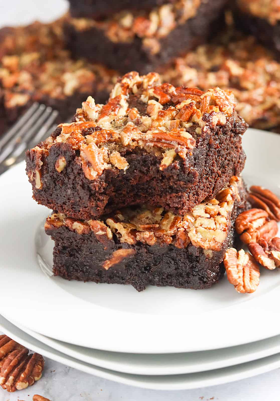 Taking a bite out of a drool-worthy pecan pie brownie