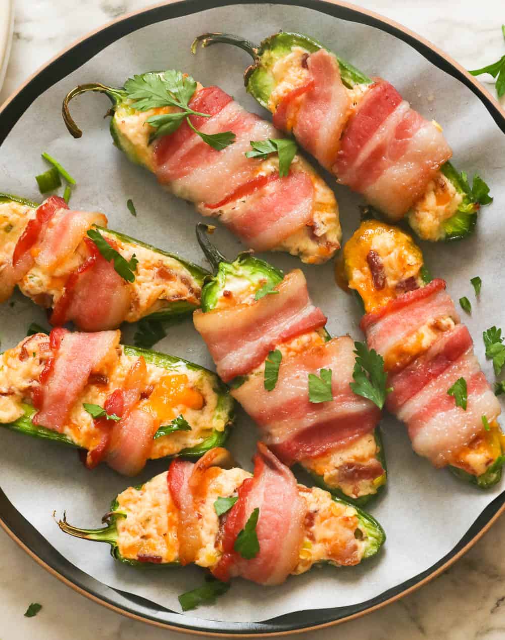 A plate of bacon-wrapped jalapeno poppers