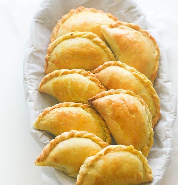 Jamaican beef patties ready to serve in a basket