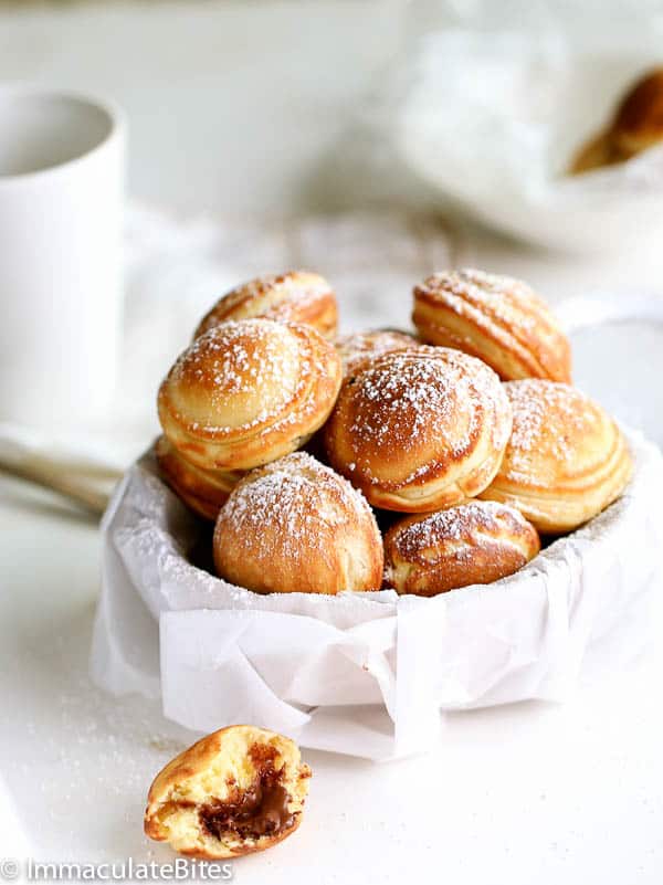 Aebleskiver Danish Pancakes dusted with powdered sugar perfect for Valentine's Day