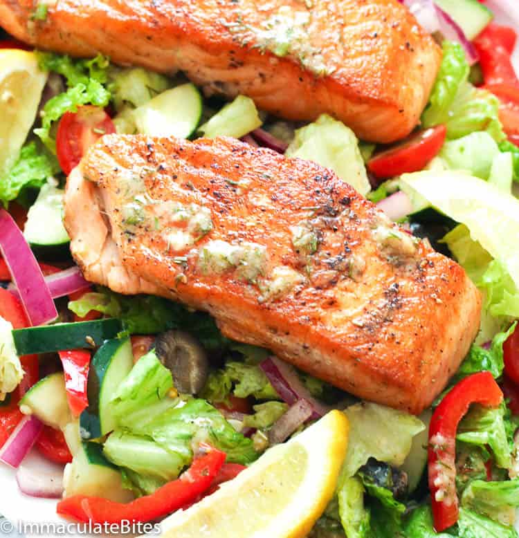 Insanely delicious salmon topping a refreshing salad