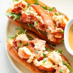 Two Connecticut Lobster Rolls and herbed butter for dipping for a delectable lunch