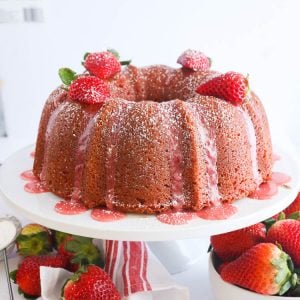 Strawberry Pound Cake with Strawberry Glaze on a Cake Stand