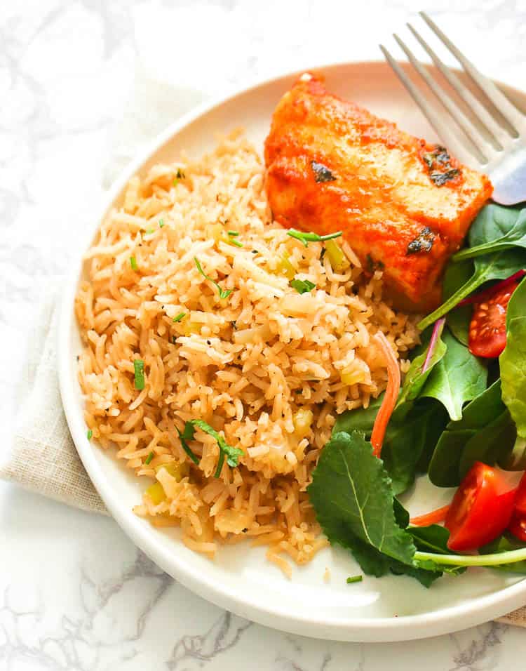 Rice Pilaf perfectly paired with oven-baked salmon and a baby greens salad for a healthy dinner