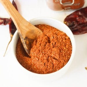 Homemade chili powder in a white bowl