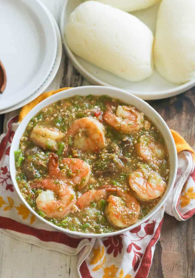 Enjoying a bowl of delectable okra soup with a plateful of fufu