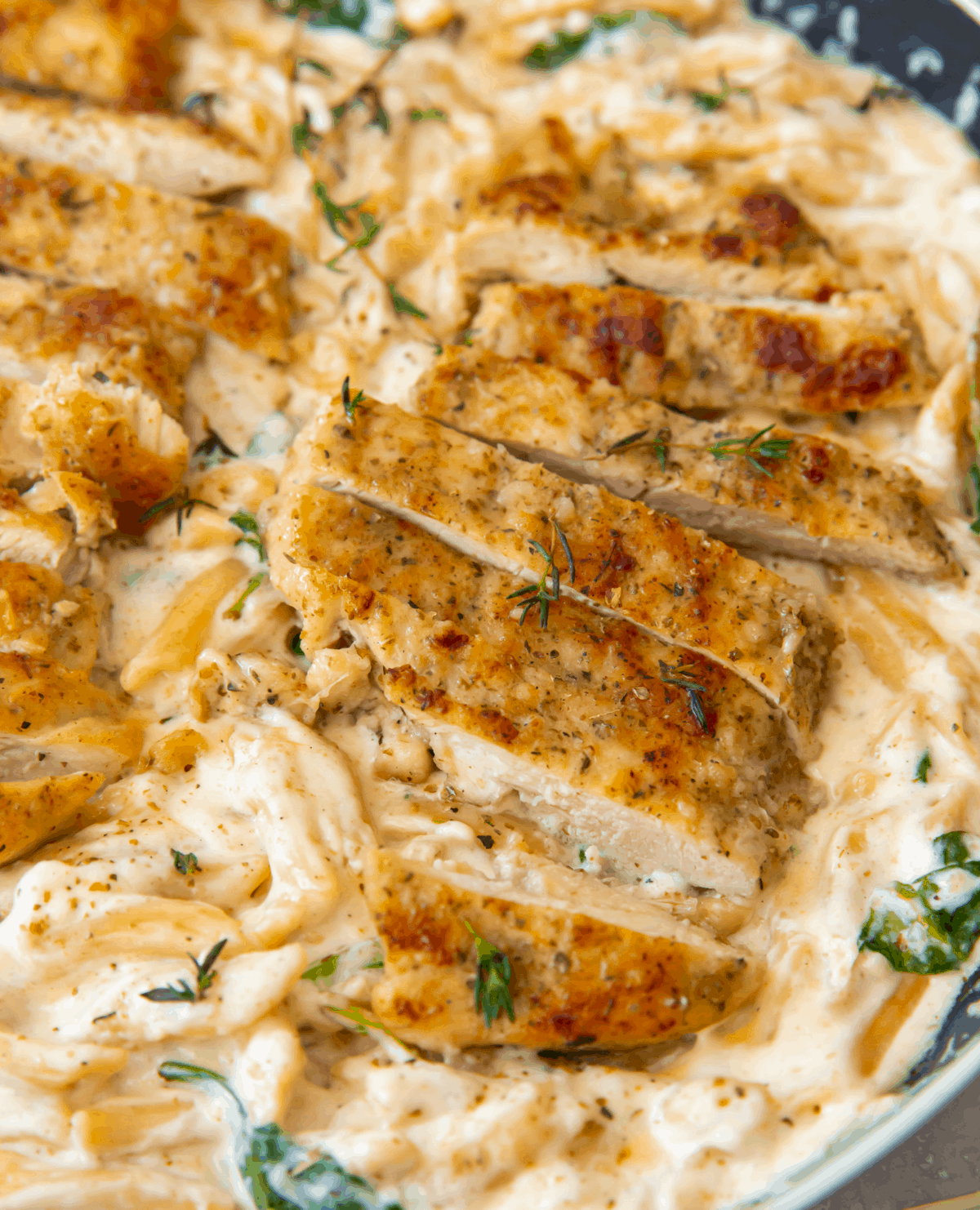 Chopped Chicken on a bed of alfredo pasta